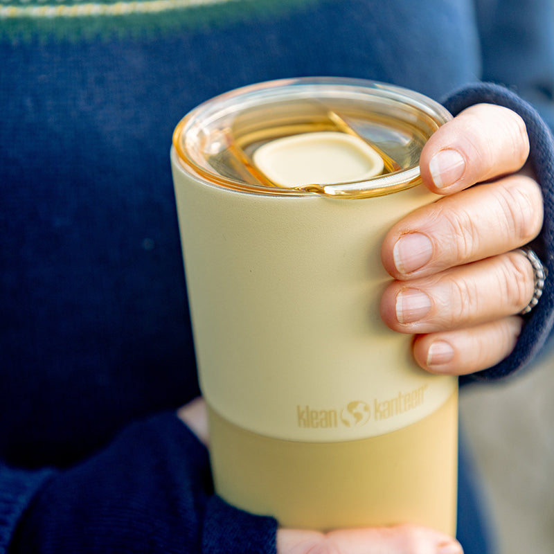 daily-on-the-go-set-t9 16oz_rise_tumbler_wax_yellow_closeup_hand_lid_square.jpg