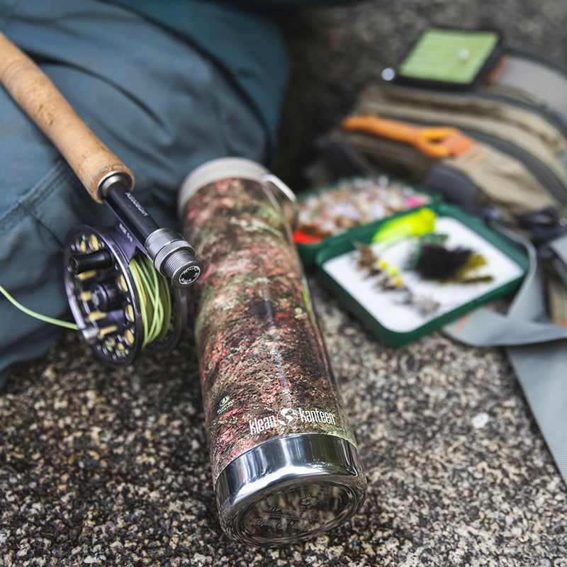 20oz-tkwide-with-cafe-cap-mossy-oak-d5 20oz_tumbler_mossyoak_rainbowtrout_flyfish_top_square.jpg