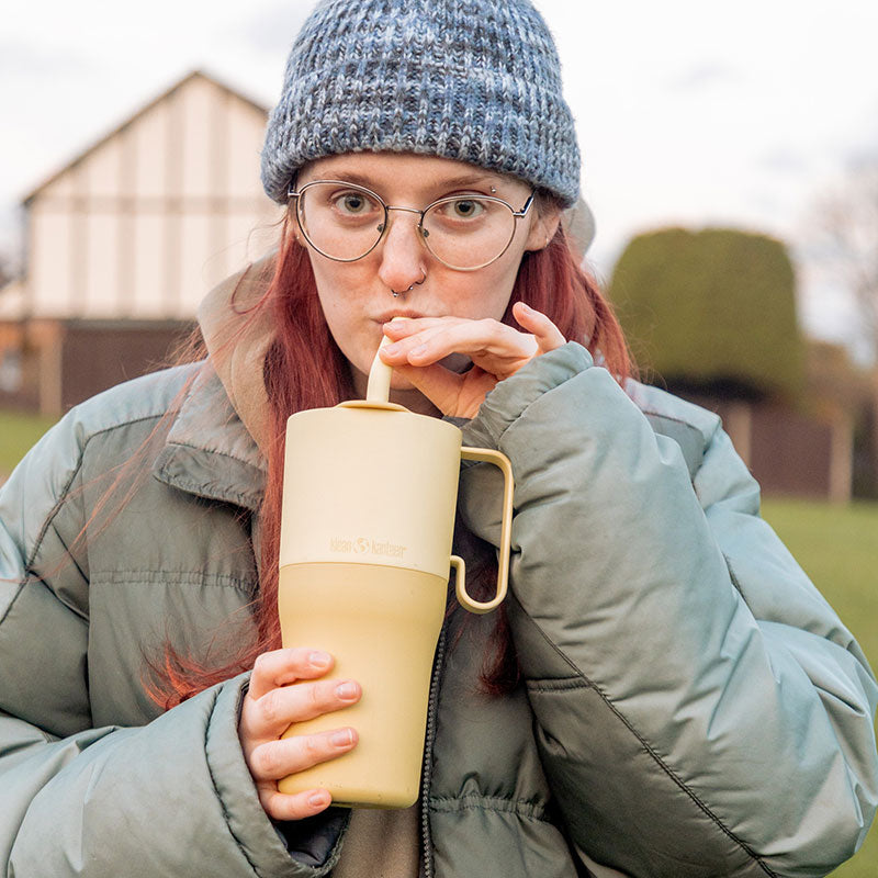 26oz-rise-tumbler-with-straw-lid-n7 26oz_rise_rumbler_straw_wax_yellow_woman_sip_square.jpg