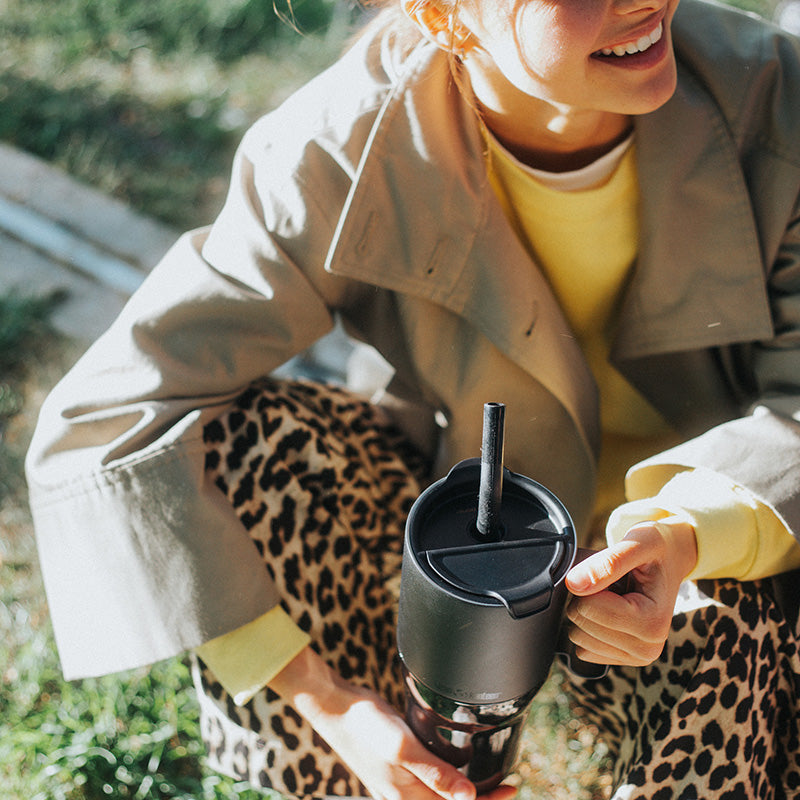26oz-rise-tumbler-with-straw-lid-n7 26oz_rise_tumbler_black_woman_topview_square.jpg