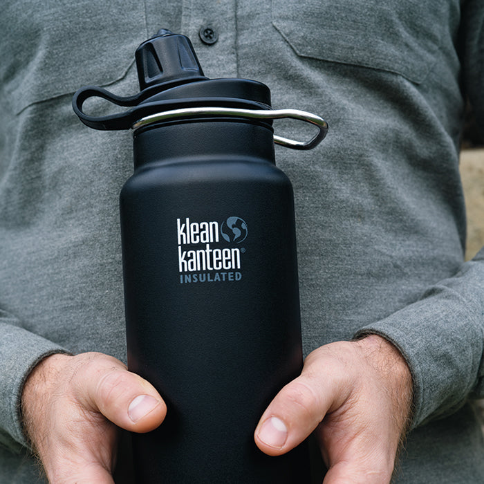tkwide-chug-cap-g0 K32TKWSSL-SB-Craddled-Bottle_closeup_lifestyle.jpg