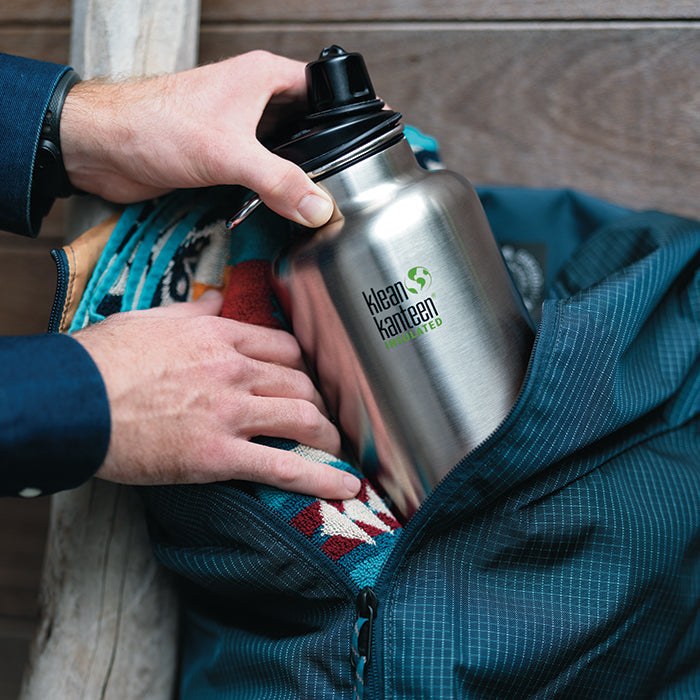 tkwide-chug-cap-g0 K64TKWSSL-BS-Chug-Cap-Out-of-Duffle_lifestyle.jpg