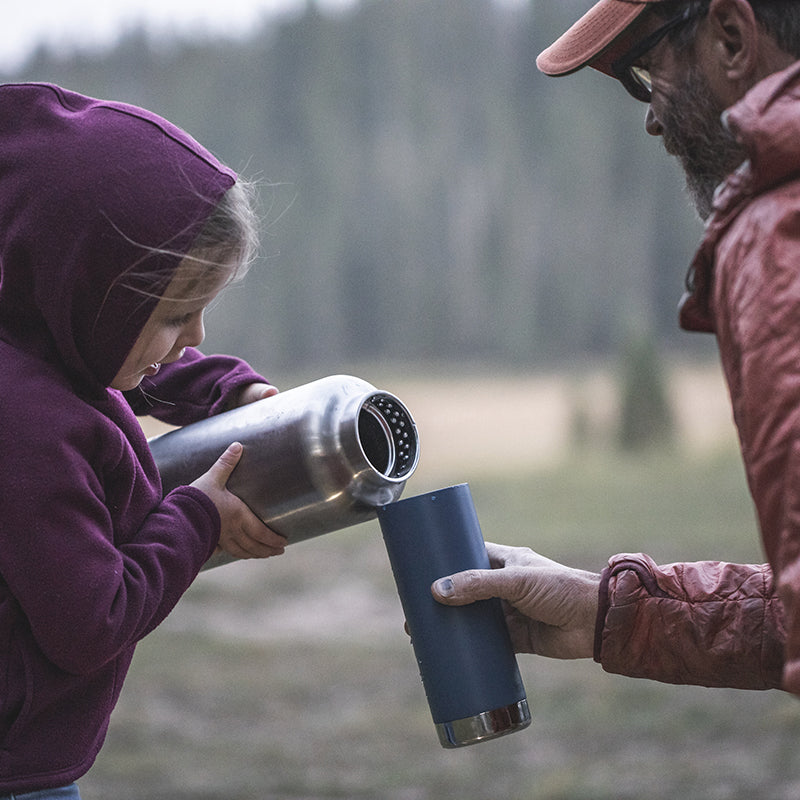 64oz-tkwide-with-loop-cap-r0 tkwide_64oz_bottle_girl_dad_filling_square.jpg